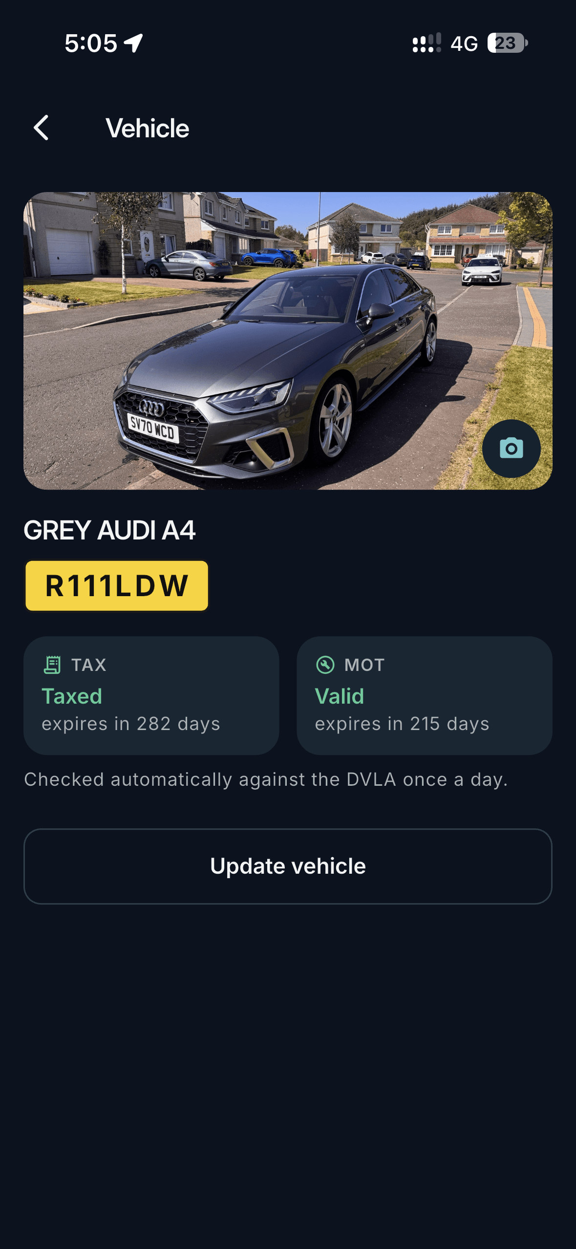 Vehicle screen with a photo of the car, its registration, and tax and MOT status checked against the DVLA